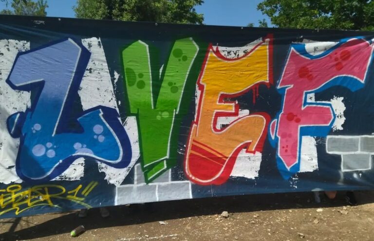 tag de LVEF en graffiti et bombe de peinture par artiste animateur